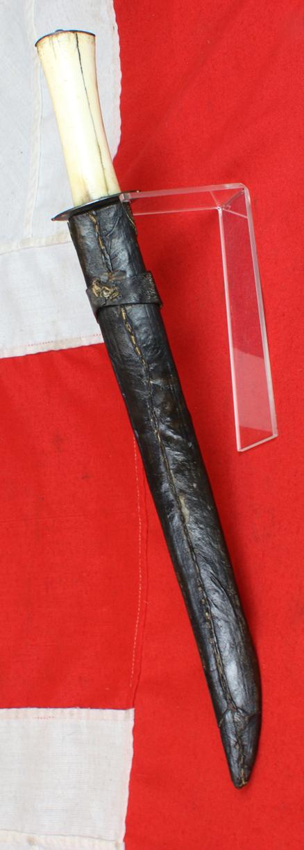 A Most Interesting & Unusual Form of Antique Tibetan Buddhist Large Dagger-Short Sword. A Dpa'dam. Decorated With Repousse Dragon and Buddha, Seated in the Padmasana Pose, in Dhyana Mudra, With Mandorla, a Coral Stone Bead Inset & Unalome Spiral Sun