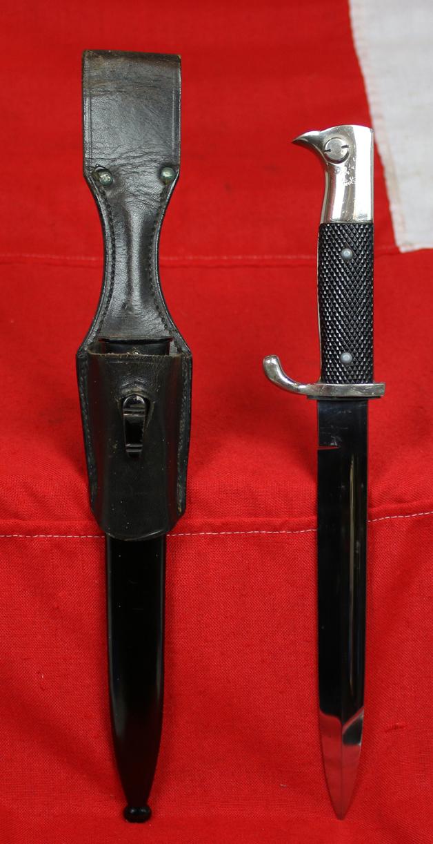 A Near Mint WW2 Third Reich German Machinegunners Close Combat Knife / Bayonet For Heer & Waffen SS, Complete With Its Original Frog Belt Mount Also In Near Mint Condition