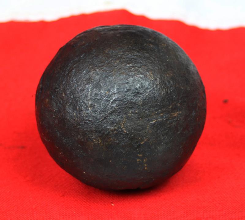 A Superb Original Waterloo Recovered Souvenir '6 Pounder ' Royal Artillery Cannon Ball Fired at La Haye Sainte During The Battle, Recovered From The Farm. With Clear impact Site To The Ball.
