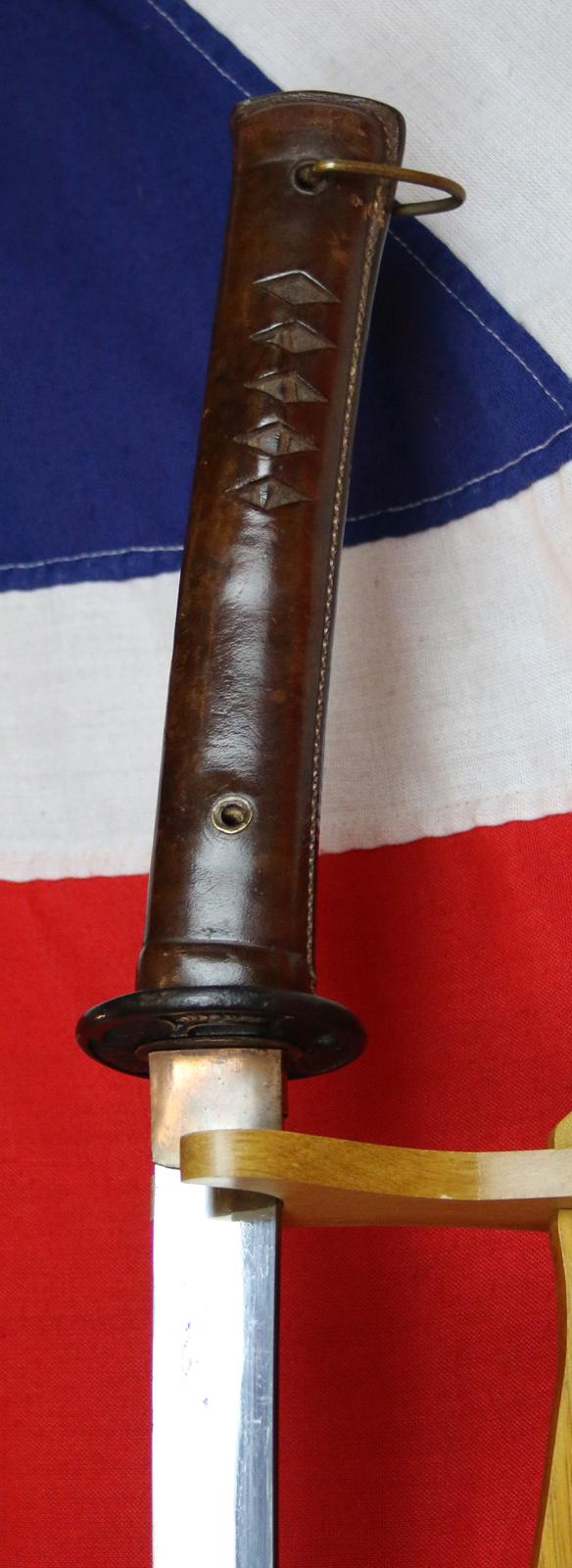 This Is A Truly Fabulous Ancestral Bladed WW2 Officer's Katana With A Rare Shinto Blade, Circa 1615, Signed Hizen no Kuni Ju Nin {Suriage, Tadayoshi} 肥前国住人 & 忠吉作 相模守義道 Bearing the Signatures of Two Master Sword Smiths of Both Hizen and Osaka