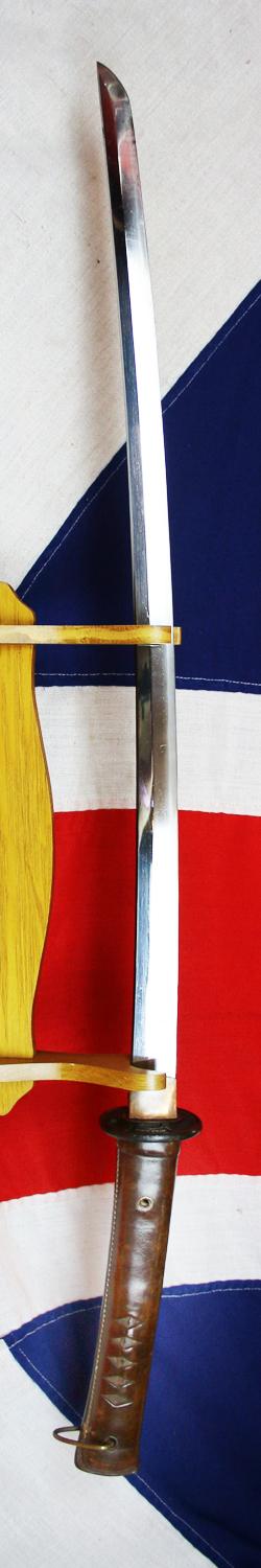 This Is A Truly Fabulous Ancestral Bladed WW2 Officer's Katana With A Rare Shinto Blade, Circa 1615, Signed Hizen no Kuni Ju Nin {Suriage, Tadayoshi} 肥前国住人 & 忠吉作 相模守義道 Bearing the Signatures of Two Master Sword Smiths of Both Hizen and Osaka