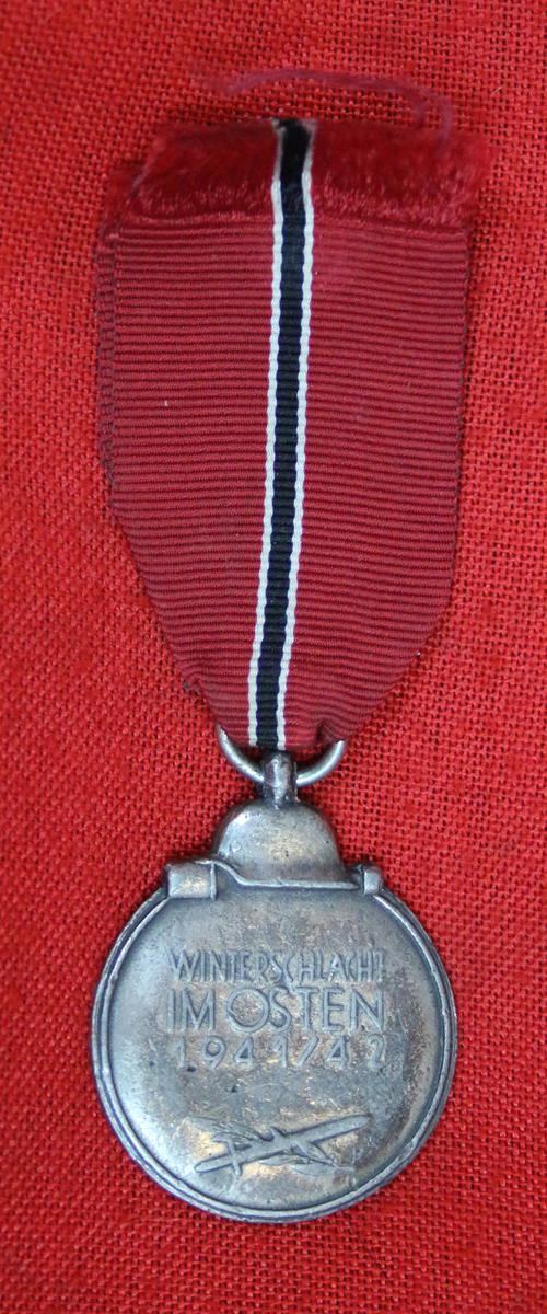 A German WW2 Eastern Front Medal Designed Original, Exceptional Example of the German SS/Heer Issue WW2 'Operation Barbarosa' Eastern Front Combat During 1941-1942 Service Medal. Designed by a Serving SS Soldier SS Untersharfuhr