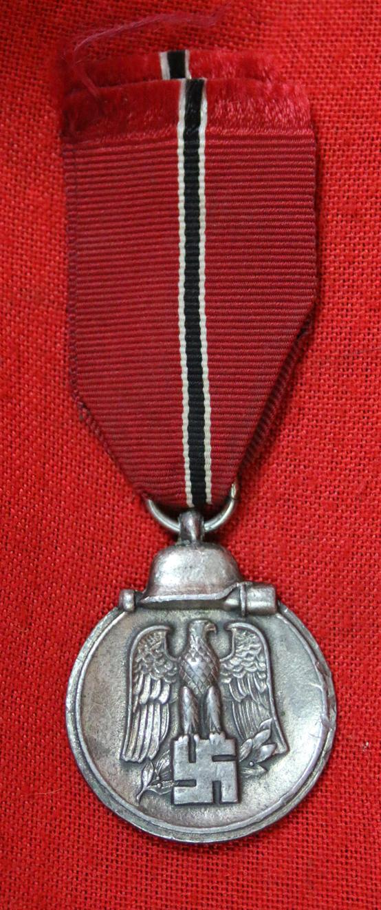 A German WW2 Eastern Front Medal Designed Original, Exceptional Example of the German SS/Heer Issue WW2 'Operation Barbarosa' Eastern Front Combat During 1941-1942 Service Medal. Designed by a Serving SS Soldier SS Untersharfuhr