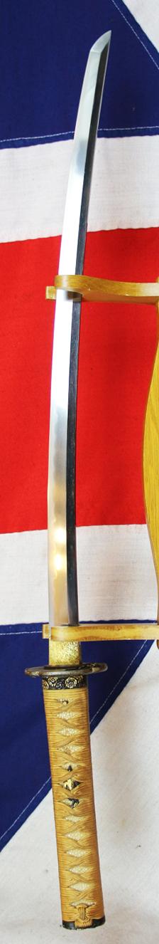 A Super and Most Beautiful Koto Wakazashi Circa 1550 With Original Edo Koshirae of Shakudo, Silver & Gold with a Nagoyamono Tsuba in Shakudo & Gold Prunus Tree With Nanako Ground and a Nanako Rim