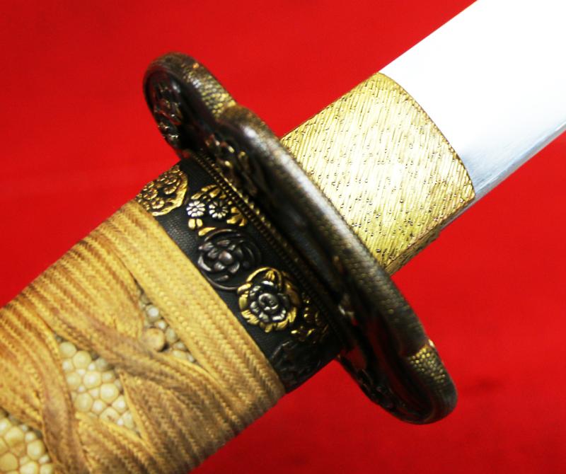 A Super and Most Beautiful Koto Wakazashi Circa 1550 With Original Edo Koshirae of Shakudo, Silver & Gold with a Nagoyamono Tsuba in Shakudo & Gold Prunus Tree With Nanako Ground and a Nanako Rim