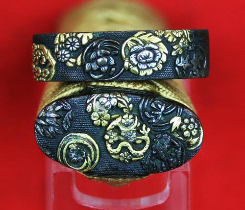 A Super and Most Beautiful Koto Wakazashi Circa 1550 With Original Edo Koshirae of Shakudo, Silver & Gold with a Nagoyamono Tsuba in Shakudo & Gold Prunus Tree With Nanako Ground and a Nanako Rim