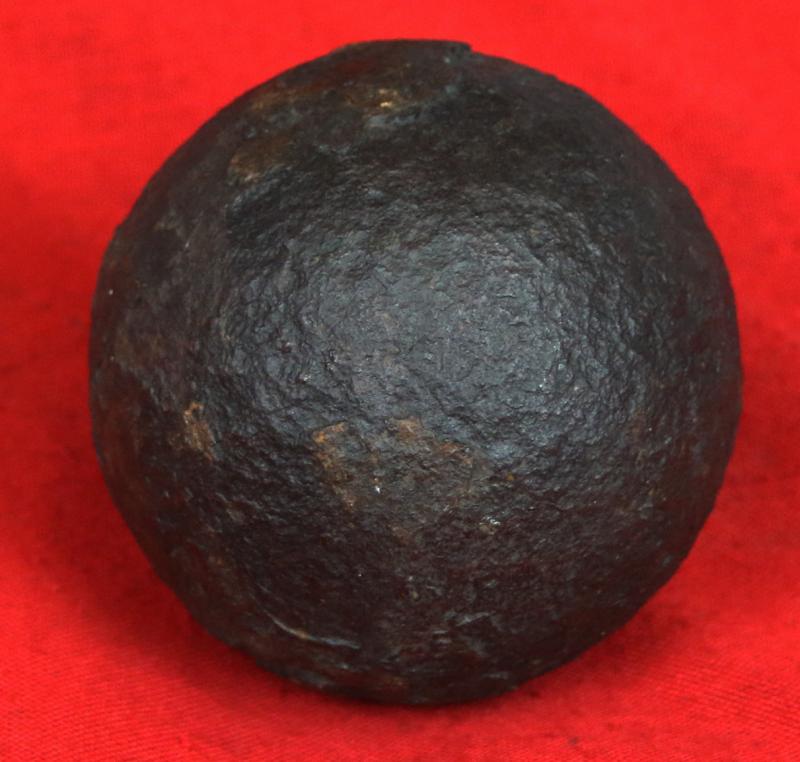 A Superb Original Waterloo Recovered Souvenir '6 Pounder ' Royal Artillery Cannon Ball Fired at La Haye Sainte During The Battle, Recovered From The Farm. With Clear Impact Site To The Ball.