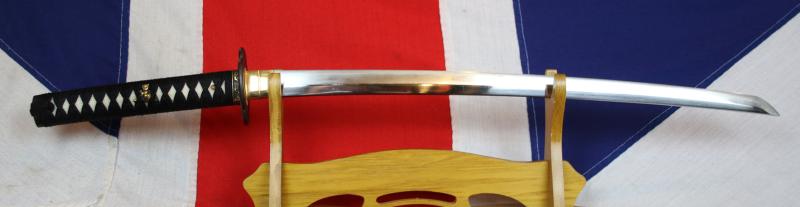 A Simply Stunning A Fabulous Original Antique Shinto Early Edo Period Chisa Katana. Wondrous Pure Gold and Shakudo Mounts Of The Tale of Momotarō, the Demon and The Monkey. Superbly Beautiful Blade Hamon and Hada Grain