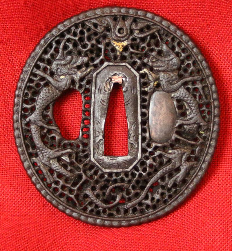 Openwork Iron Nanban Tsuba With A Pair of Dragons and Golden Nunome-Zogan Decor. A Most Fine Japanese 17th Century Sword Guard