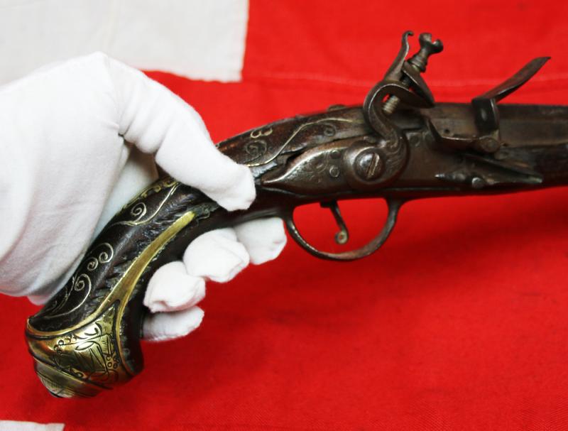 A Superb Corsairs Pirate Pistol. An I8th Century Long Flintlock, Italianate Style. Very Fine Quality Mounts and Engraving From The Mediterranean Region, as Used Throughout the Seven Seas From the Golden Age of Piracy.