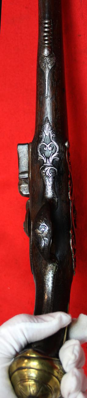 A Superb Corsairs Pirate Pistol. An I8th Century Long Flintlock, Italianate Style. Very Fine Quality Mounts and Engraving From The Mediterranean Region, as Used Throughout the Seven Seas From the Golden Age of Piracy.