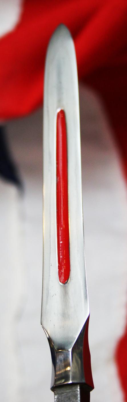 From the Roald Knutsen Collection. A Superb Hira Sankaku Yari Blade Signed Yamashiro no kami Kunishige 1751 in Superb Condition with fine Suguha Hamon, and an Horimono Cut Bo-Hi {Fuller} Decorated with Red Lacquer