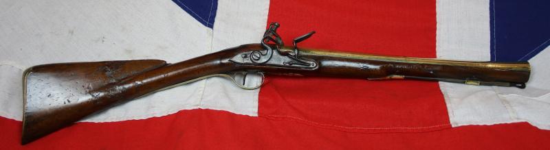 A Fine 18th Century Historic Blunderbuss With Brass Flared Mouth Barrel, Fine Walnut Stock and Engraved Brass Furniture. By Griffin and Tow London Circa 1775. One Of England's Great Gunsmith Partnerships