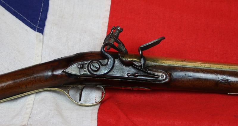 A Fine 18th Century Historic Blunderbuss With Brass Flared Mouth Barrel, Fine Walnut Stock and Engraved Brass Furniture. By Griffin and Tow London Circa 1775. One Of England's Great Gunsmith Partnerships