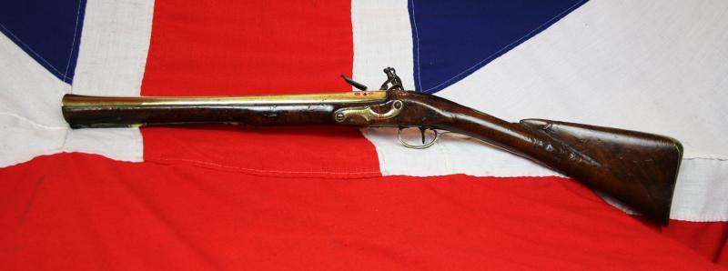 A Fine 18th Century Historic Blunderbuss With Brass Flared Mouth Barrel, Fine Walnut Stock and Engraved Brass Furniture. By Griffin and Tow London Circa 1775. One Of England's Great Gunsmith Partnerships