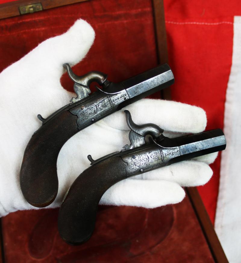 A Superb “American” Cased Pair of 1850 Derringers, Gambler’s Waistcoat or Boot Pistols By Wilson, of Superb Quality. A Very Neat Little Pair Of Large Calibre Small Pistols The Type of Earliest ‘Derringer’ Pistols Ideal For Concealment. Damascus Barrels.