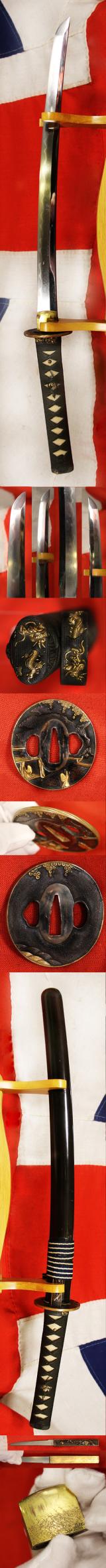 A Beautiful Koto Wakazashi, In Superb Edo Goto Fittings Shakudō (赤銅) Dragon Fuchigashira & Tsuba Signed Omura Kanenori.